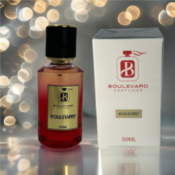 a bottle of perfume next to a box