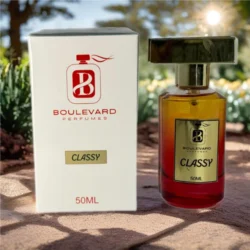 a bottle of perfume next to a box